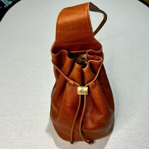 Mark Cross Sling Bucket Bag in Brown Pebbled Leather with Brass Hardwear